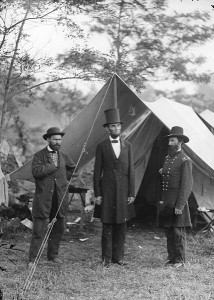 Lincoln in his trademark top hat (with Pinkerton in the Bowler and McClernand)