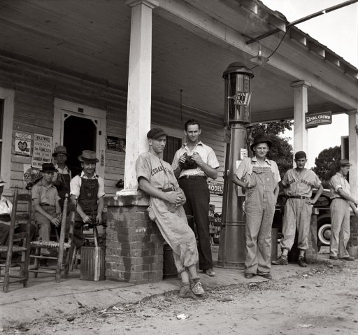 Fourth of July 1939 near Chapel Hill, North Carolina. Rural filling stations become community centers and general loafing grounds. Cedargrove Team members about to play in a baseball game.